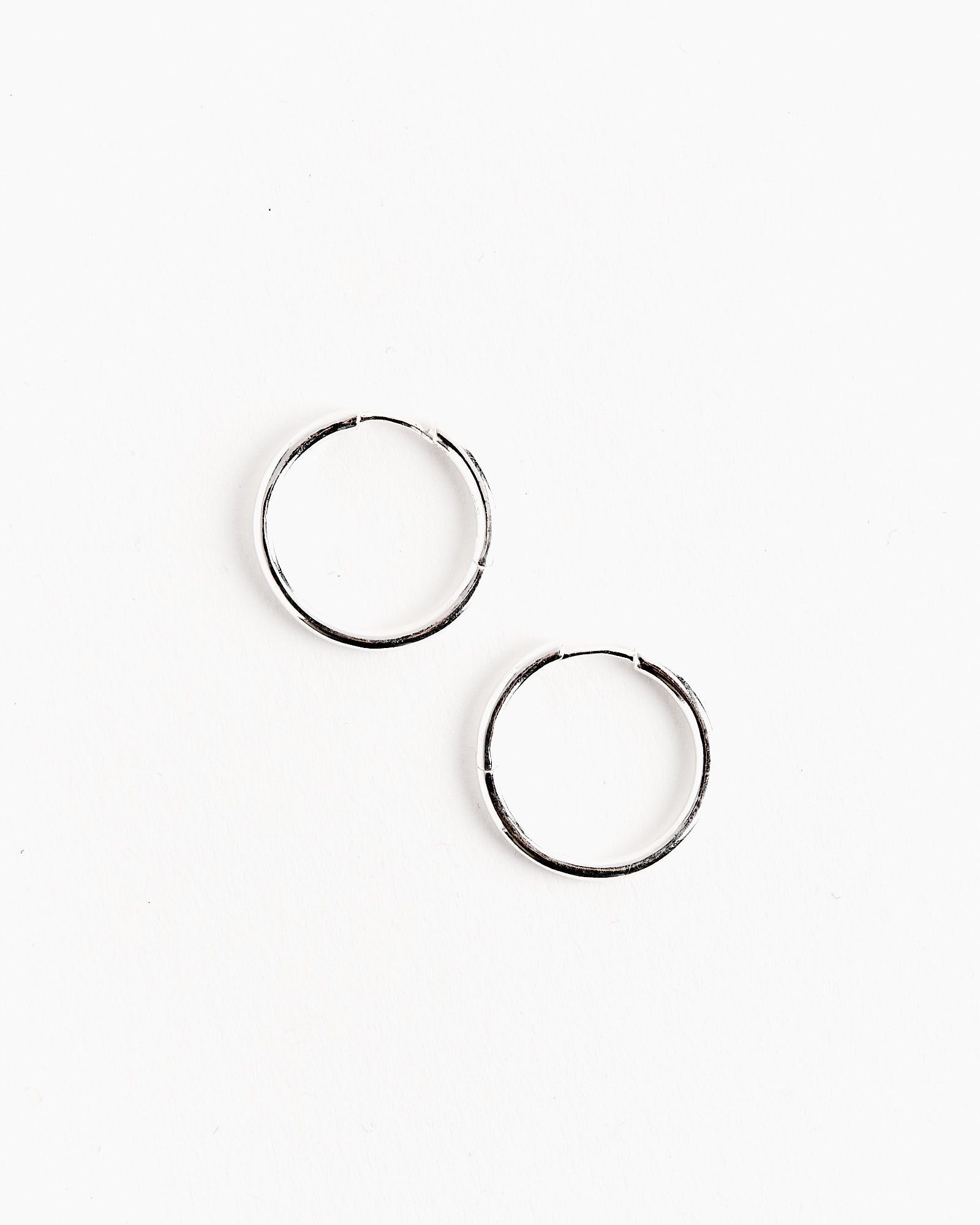Medium Seamless Hoops in Silver Tone