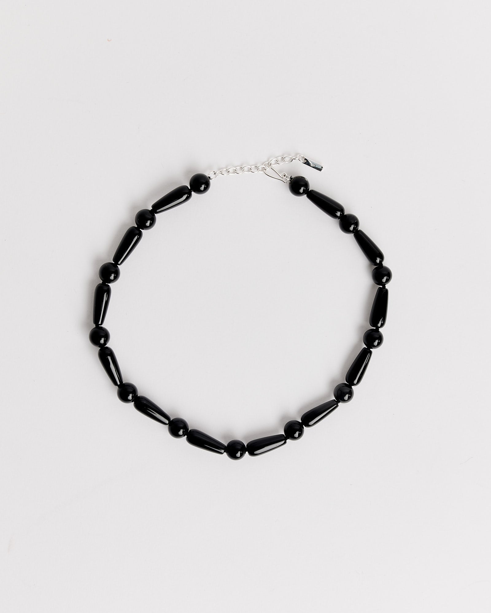The Depths Of Time Necklace in Black Onyx/Silver Plated