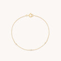 Topaz Charm Bracelet in Solid Gold