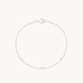 Topaz Charm Bracelet in Solid White Gold