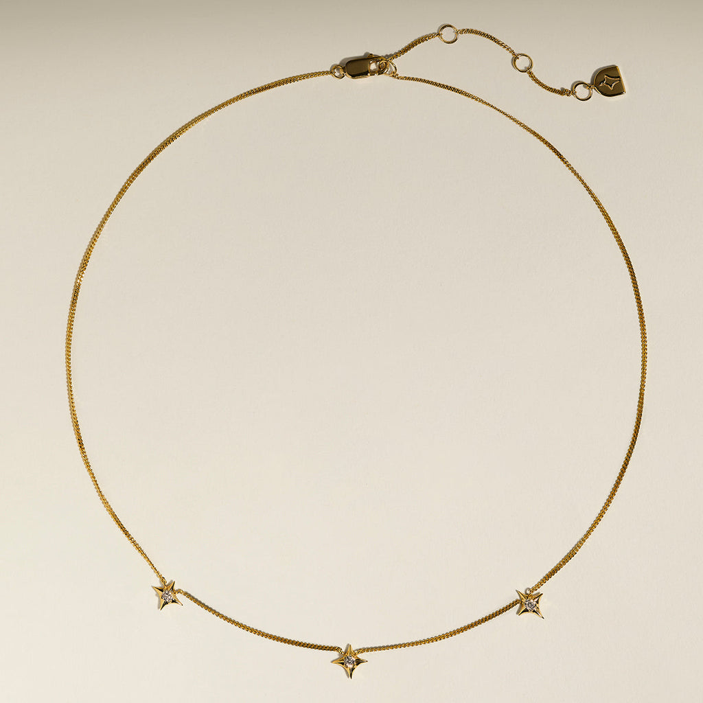Cosmic Star Charm Necklace in Gold