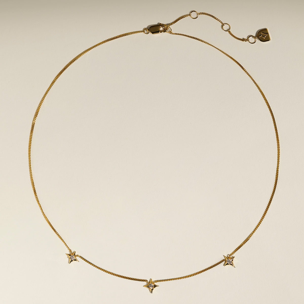 Cosmic Star Charm Necklace in Gold