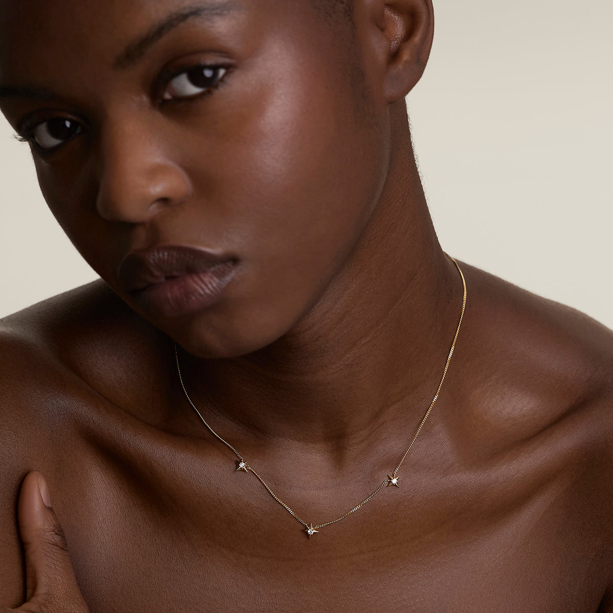 Cosmic Star Charm Necklace in Gold