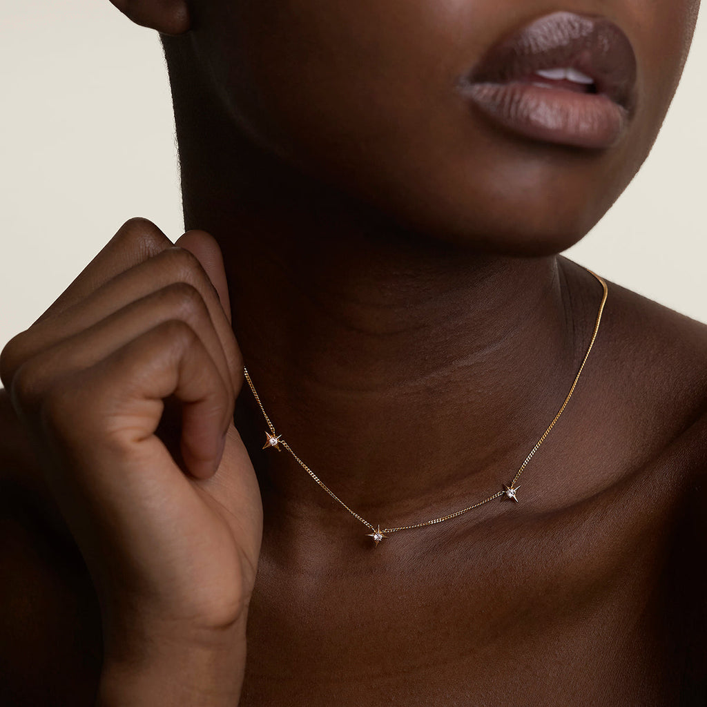 Cosmic Star Charm Necklace in Gold