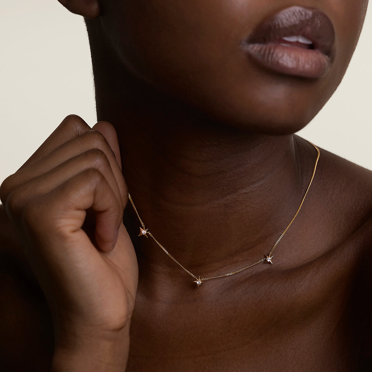 Cosmic Star Charm Necklace in Gold