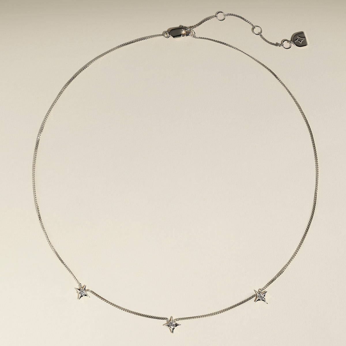 Cosmic Star Charm Necklace in Silver