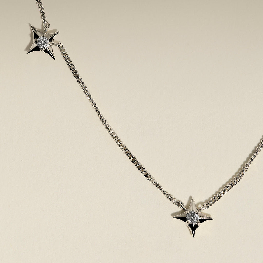 Cosmic Star Charm Necklace in Silver