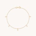 Cosmic Star Charm Bracelet in Solid Gold