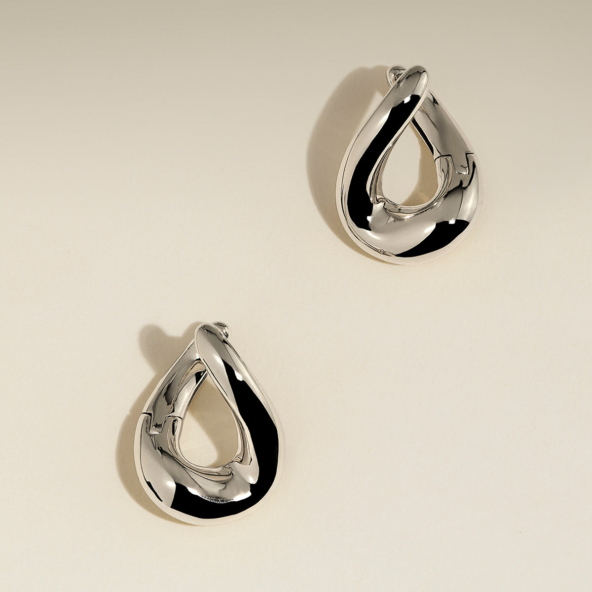 Molten Hoops in Silver