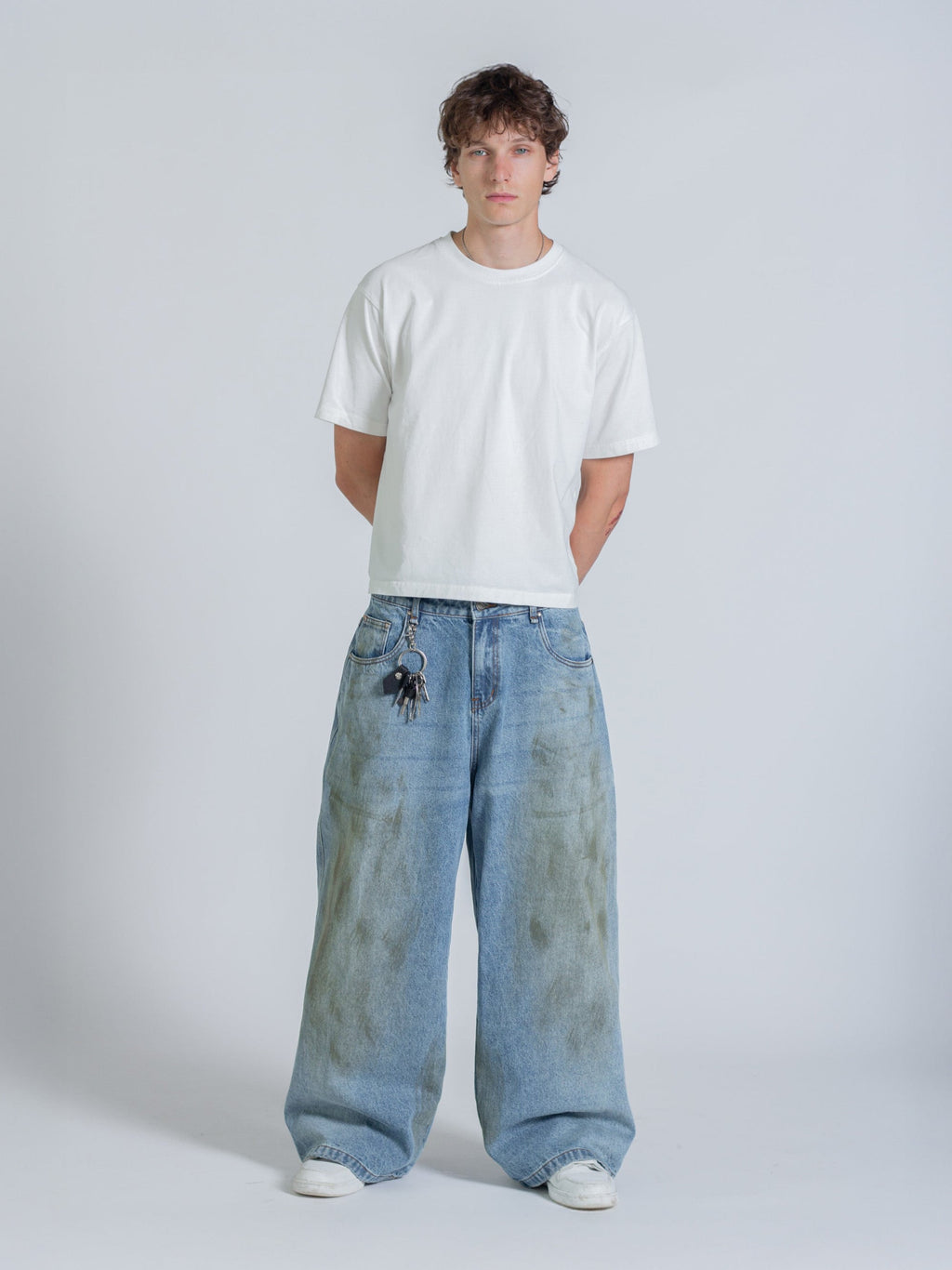 MUD STAINED JEANS - LIGHT BLUE