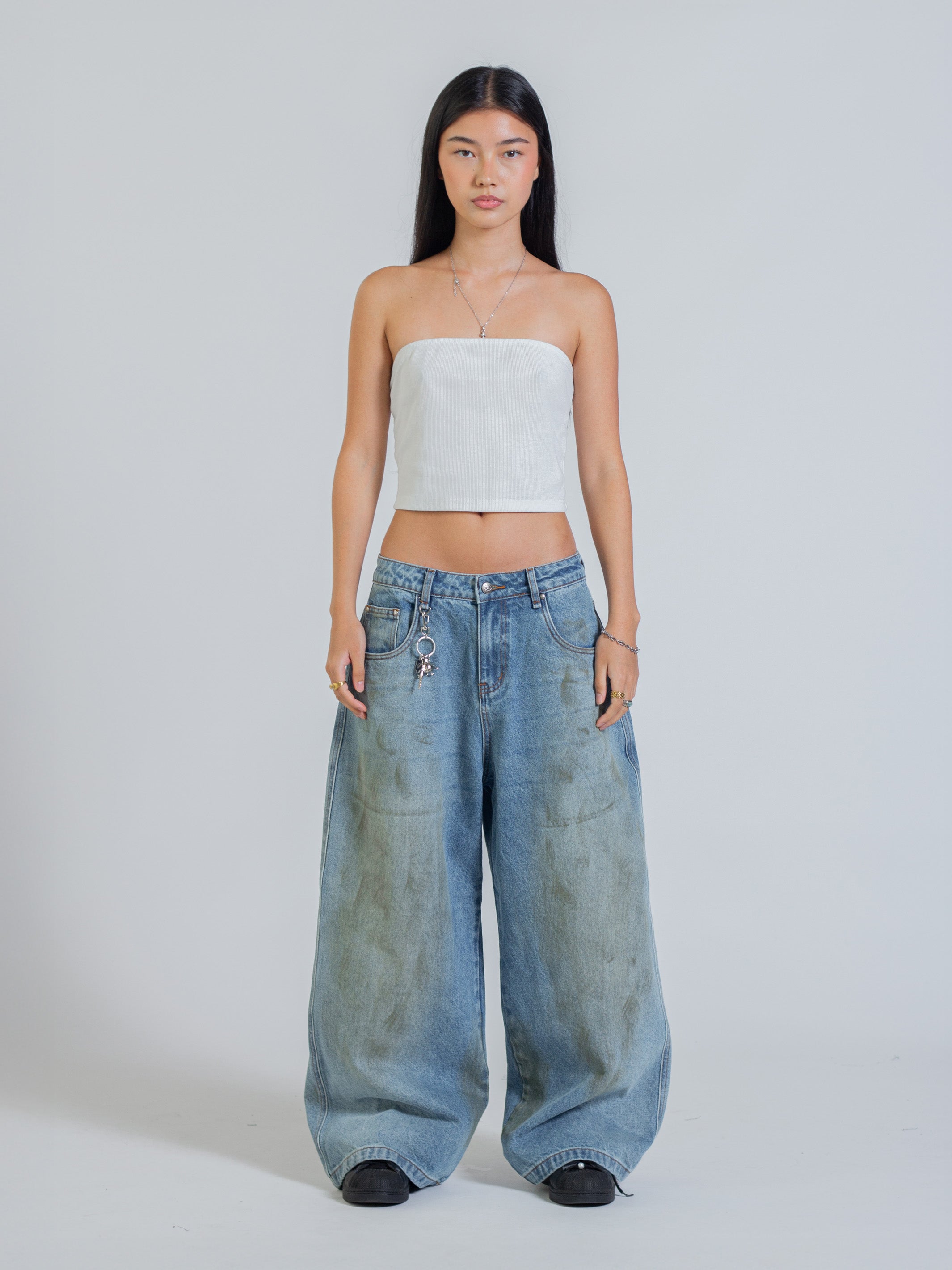 MUD STAINED JEANS - LIGHT BLUE