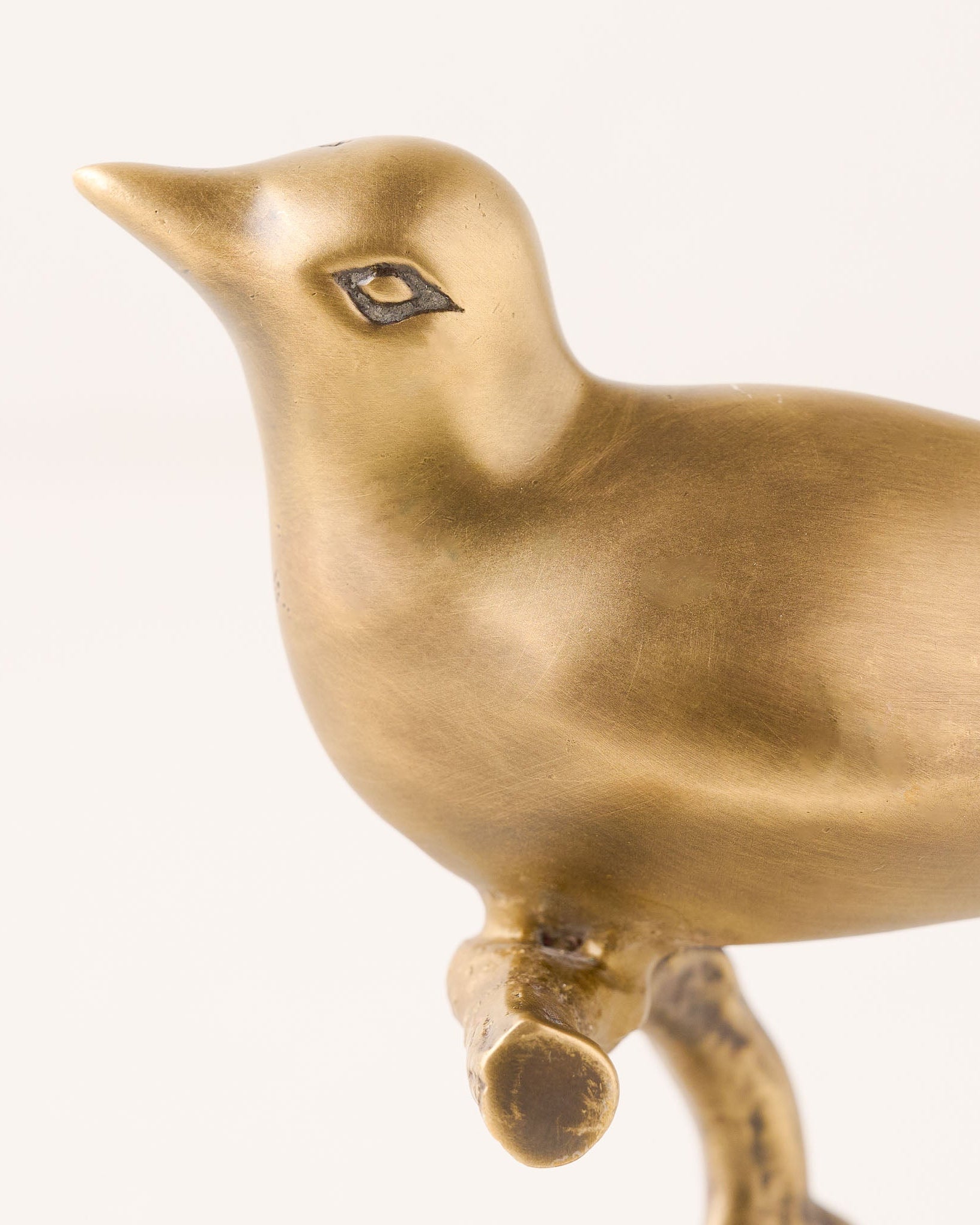 Brass Bird Sit About