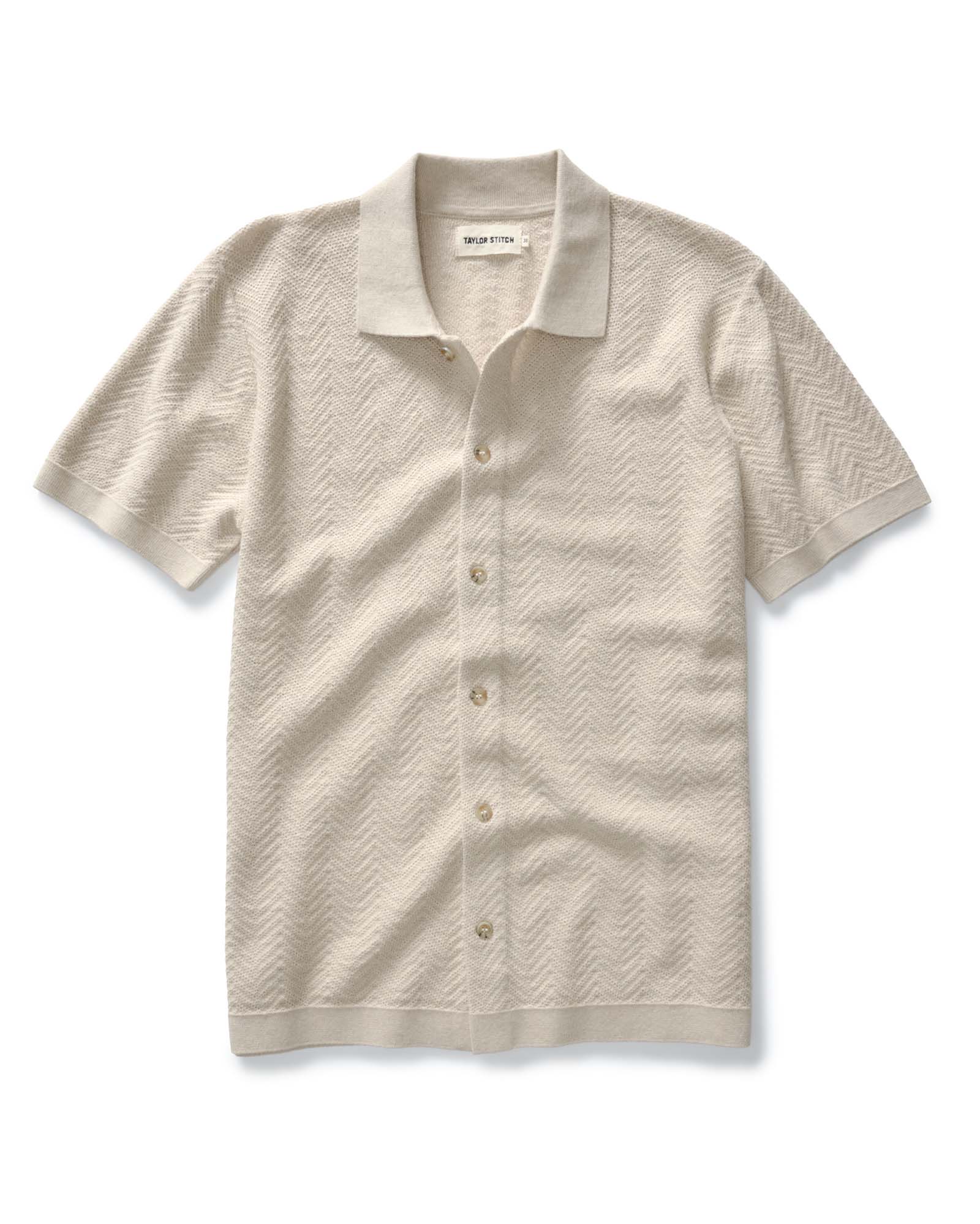 The Button Down Polo in Heather Oat Herringbone