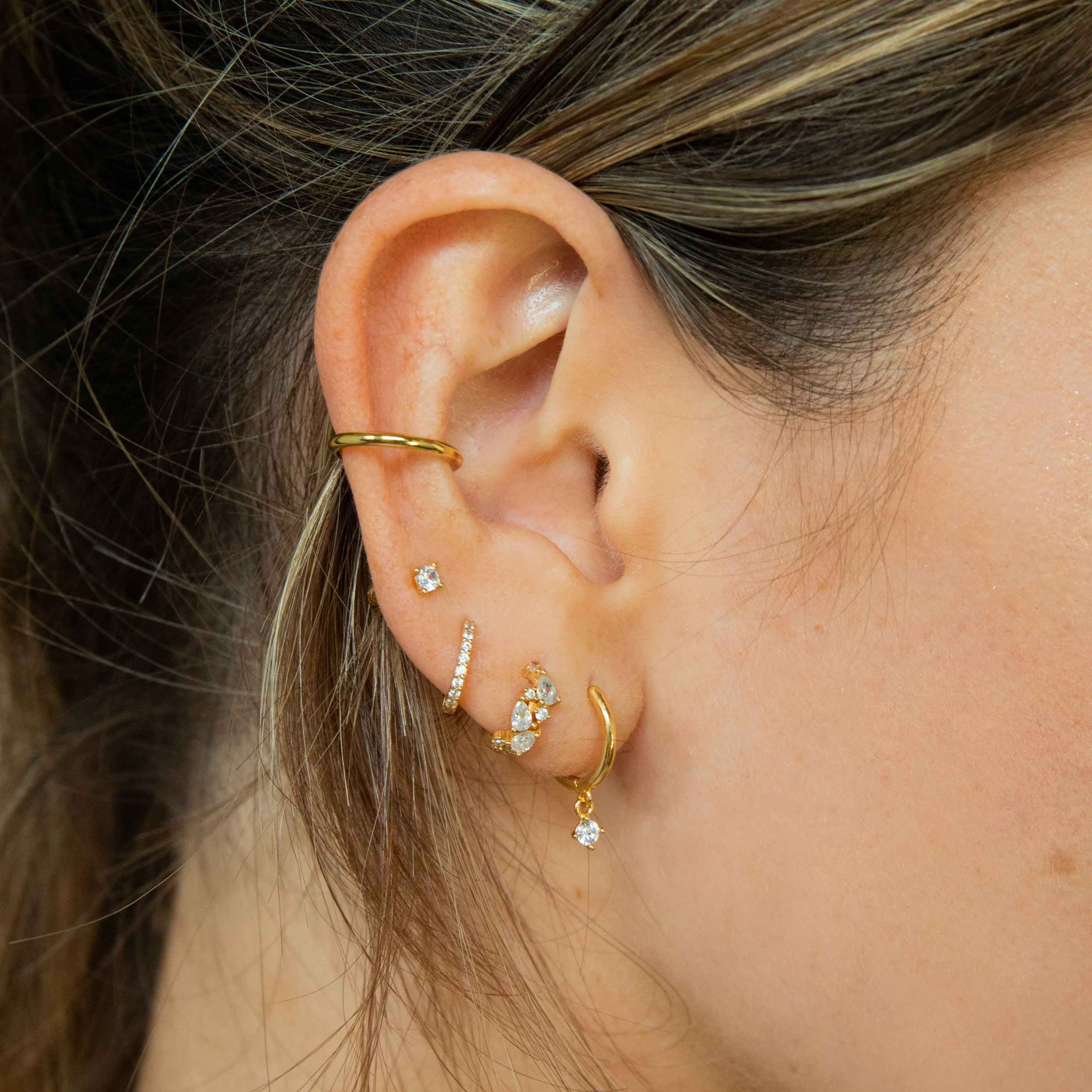 April Birthstone Huggies in Gold with Clear CZ